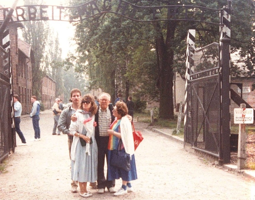 Kolender Family at the entrance to Auschwitz